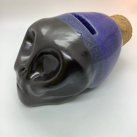 Ceramic skull money box