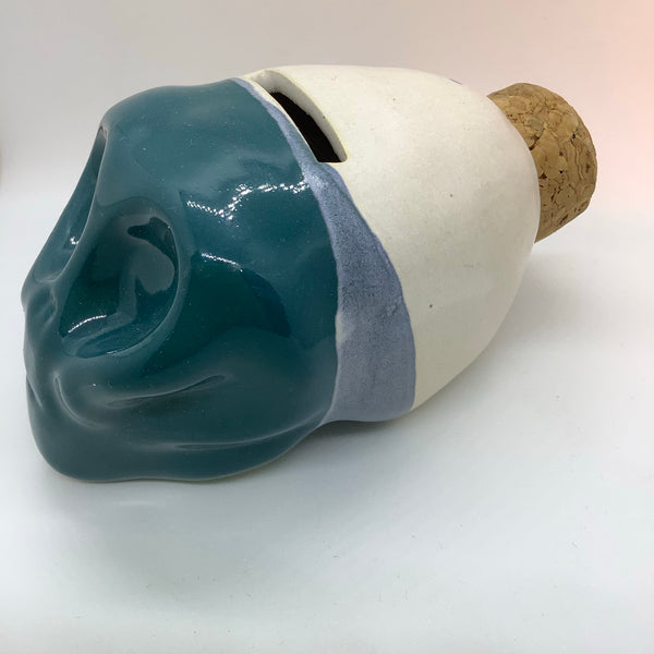 Ceramic skull money box